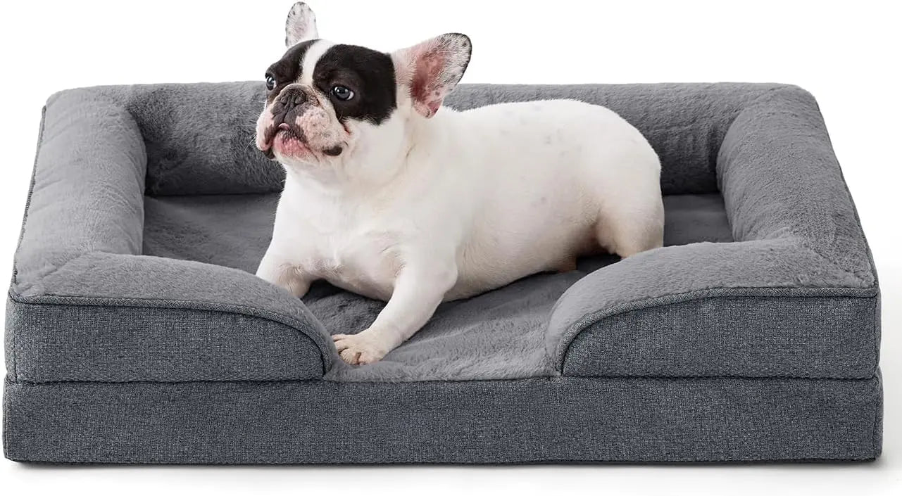 FelRelWel gray dog sofa bed with soft cushioned sides and a small French Bulldog lying comfortably